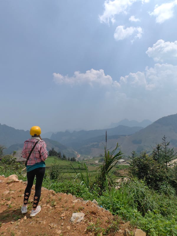Motorcyclists capture scenic mountain views in rural Vietnam