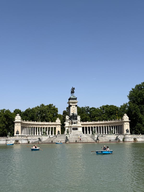 Afternoon in Retiro Park: monuments, lake, and Madrid streets