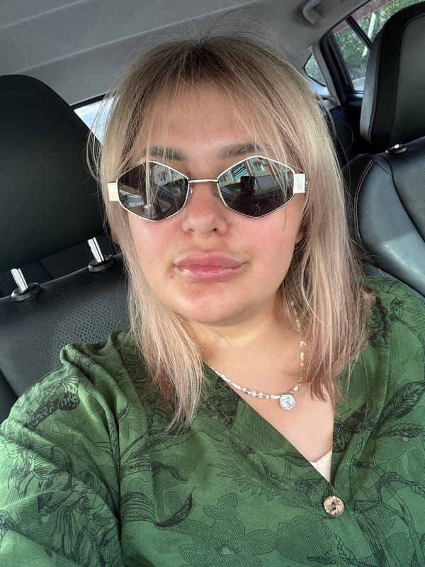 Woman takes selfies in car and outdoors in Birobidzhan