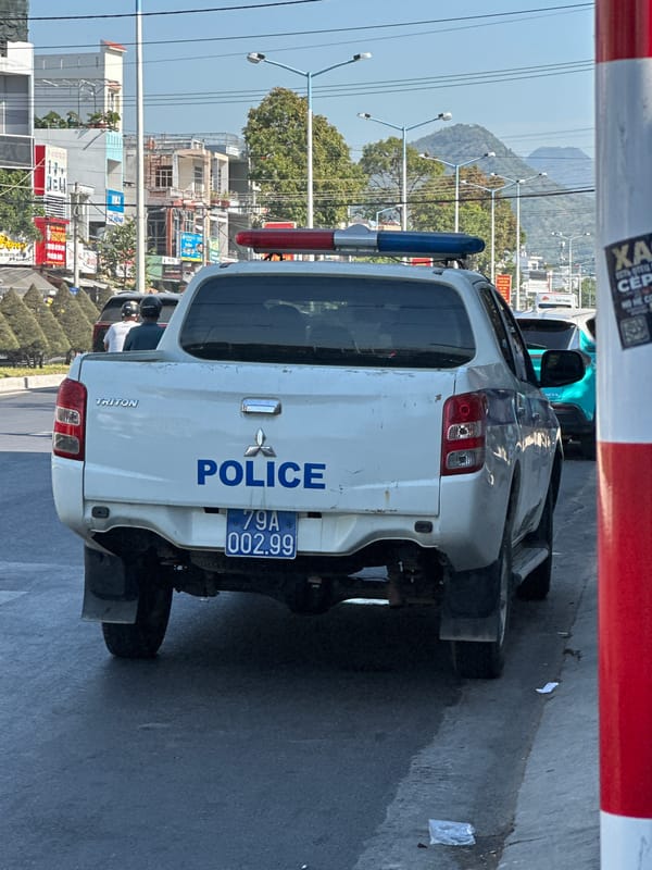 Daily Life Scenes Documented in Nha Trang, Including Damaged Police Vehicle