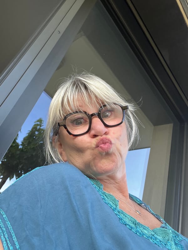 Woman poses for photo on patio in Chambœuf