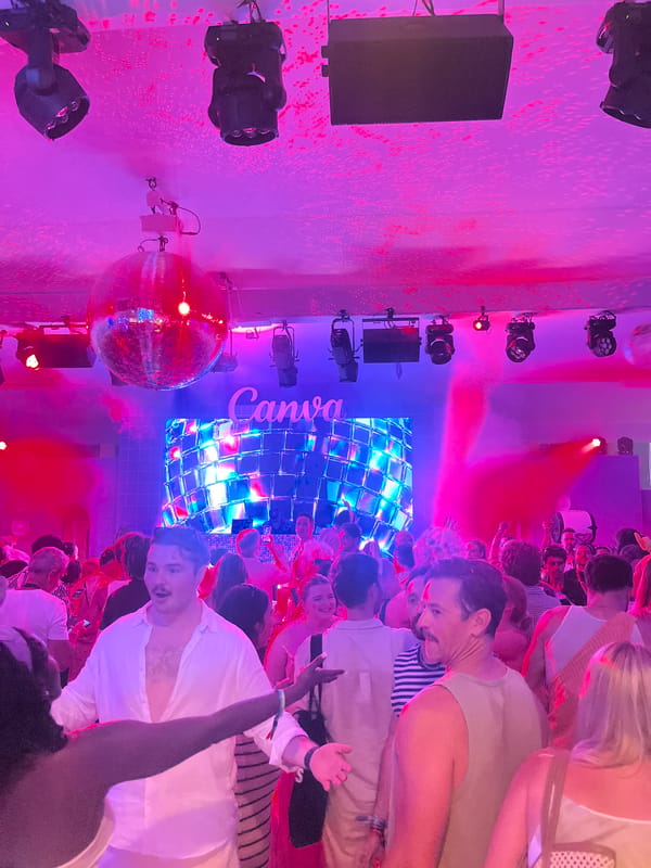 Face painting and dancing at a Cannes indoor party