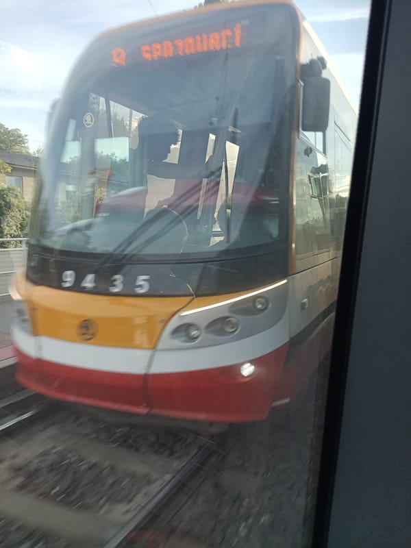 Prague tram operations documented on Parléřova Street Saturday evening