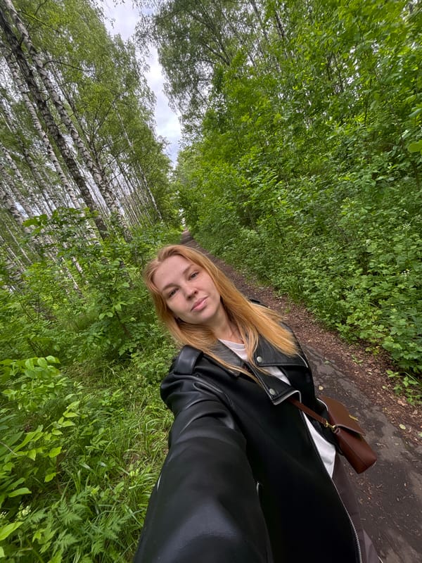 Woman and child travel through Yaroslavl on morning outing