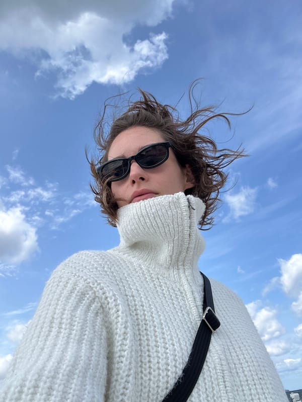 Breezy morning at Laboe beach, wicker chairs and windswept looks