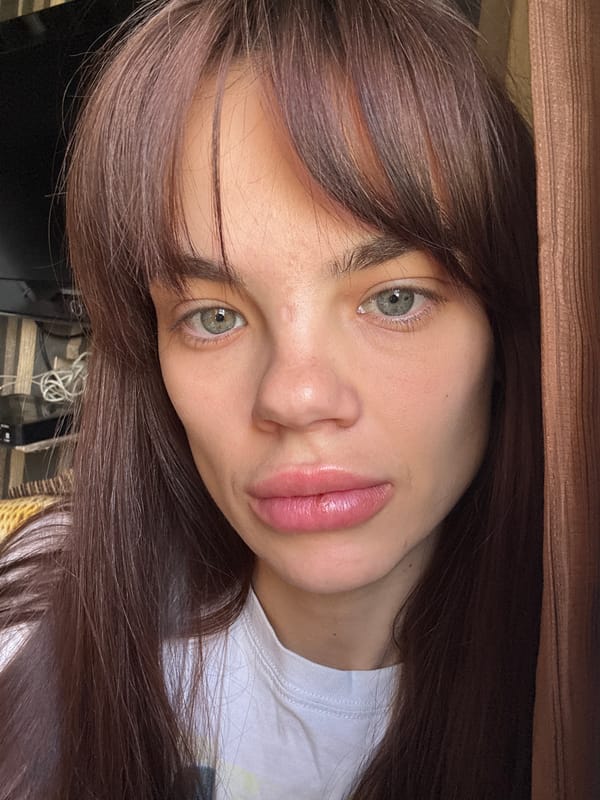 Woman documents morning selfie session across Rostov-on-Don home