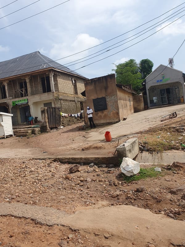 Street life and commerce along Lokoja's dusty roads