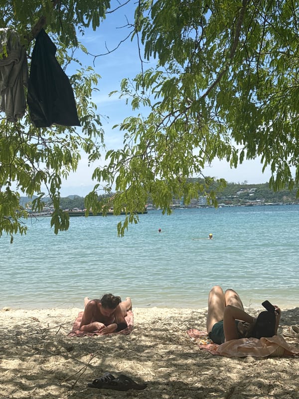 Lazy morning on Nha Trang beach, sun and turquoise water