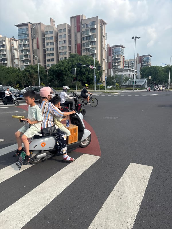 Morning street life at a busy Suzhou Industrial Park intersection
