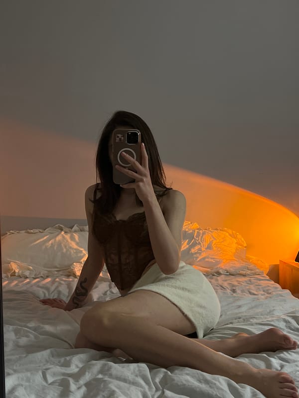 Person Takes Extended Selfie Session in Ternopil Bedroom