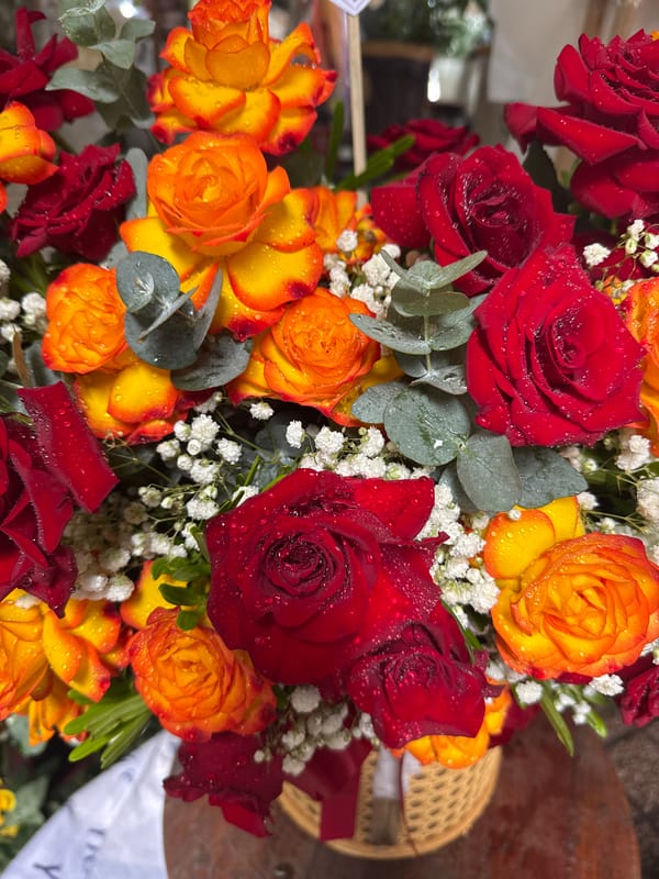 Fresh flowers and street vendors at a Nha Trang market