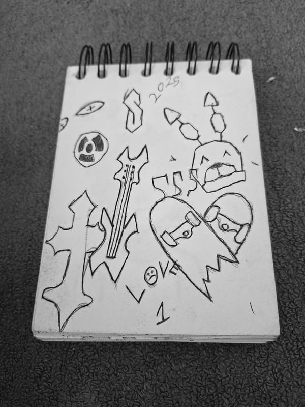 Artist sketches Gorillaz character in notebook during afternoon session