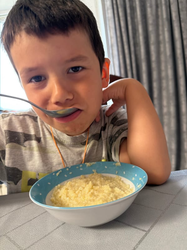 Breakfast porridge shared around a table in Chaikovsky