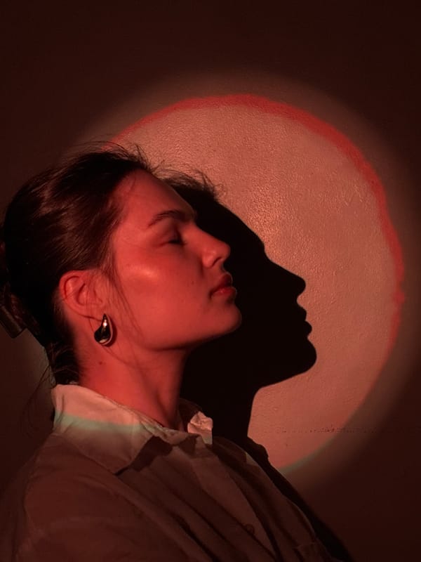 Late-night self-portrait session with colored lights in Chaikovsky