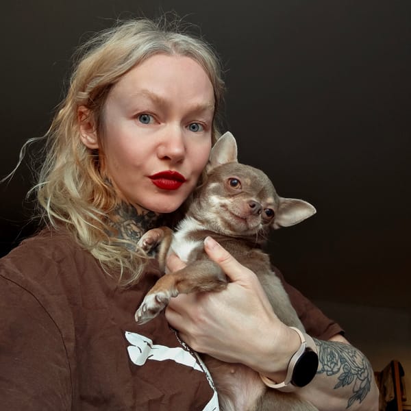 Dog owners and pets captured in quiet Saint Petersburg moments