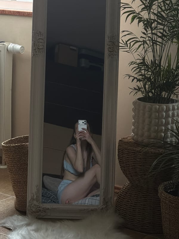 Mirror selfies and street scenes from a quiet afternoon in Gorzów