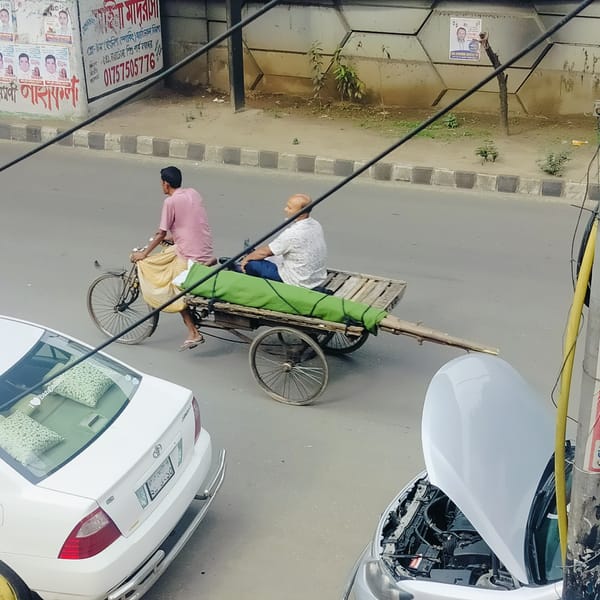 Bicycle rickshaw transports passengers, metal sheets in Dhaka street scene