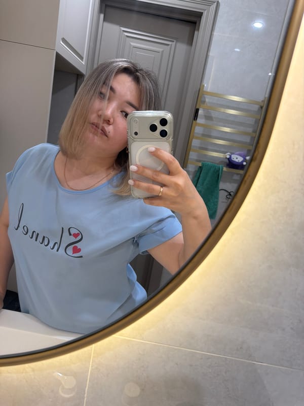 Mirror selfie session in modern Astana bathroom