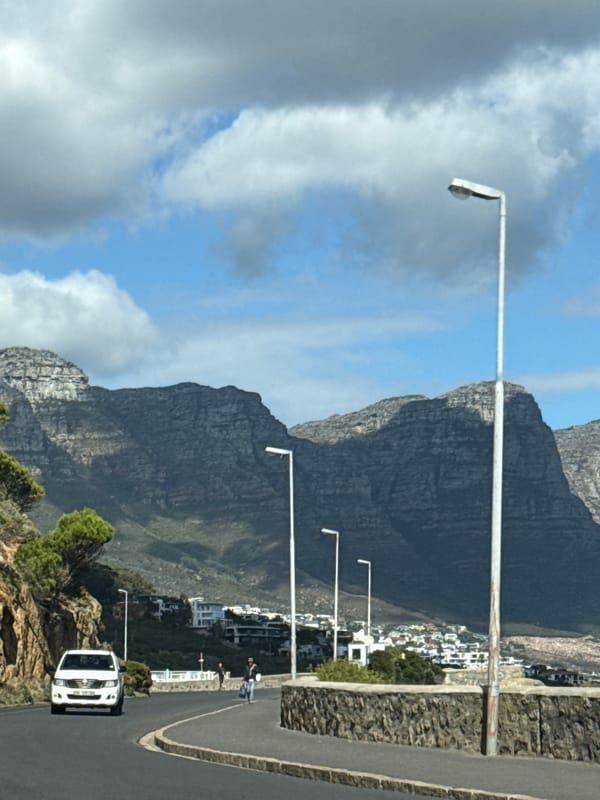Cape Town mountain landscape photographed under partly cloudy skies