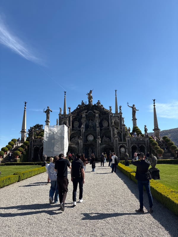 Tourists gather at Isola Bella pathway in Lago Maggiore