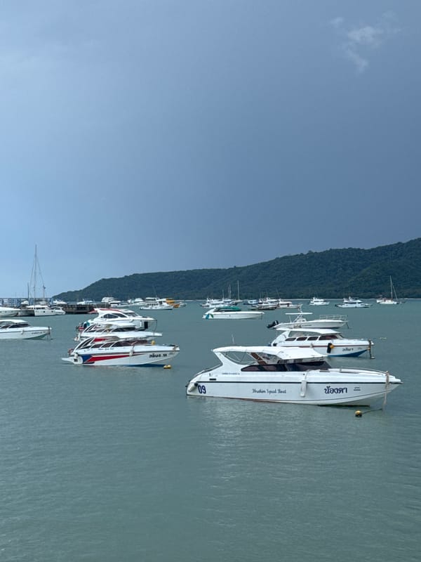 Chalong Bay harbor on a stormy morning, boats at rest