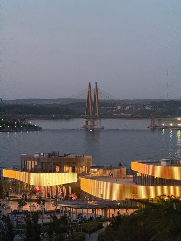Evening cityscape captured in Kazan featuring Millennium Bridge
