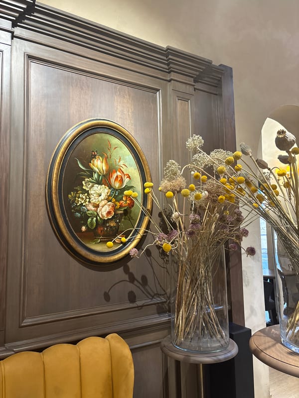 Inside a historic Roman palace: frescoes, statues, and old masters