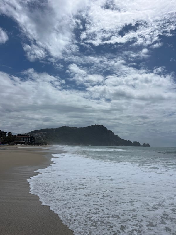 Beachgoers document morning waves and activity in Alanya, Turkey