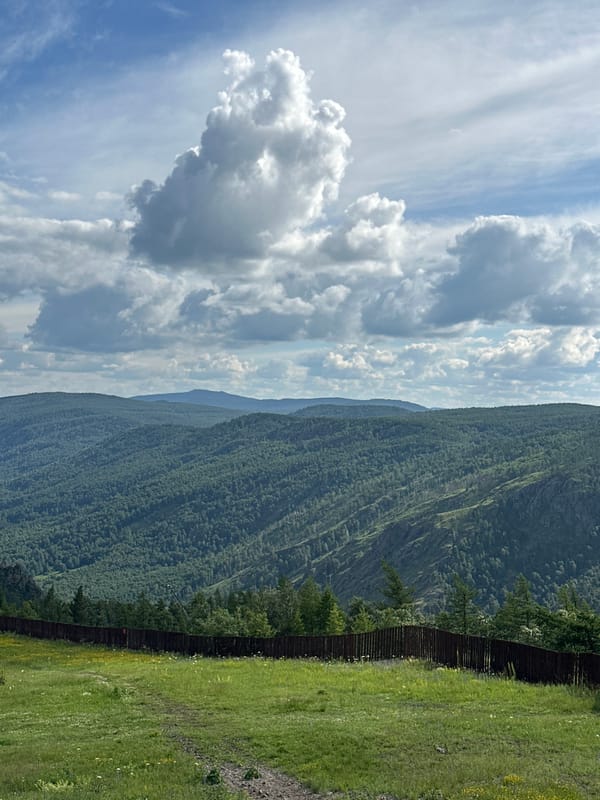 Summer day at Bannoe resort: boulders, gondolas, and valley views