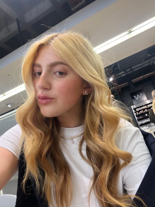 Woman Takes Mirror Selfies in Johannesburg