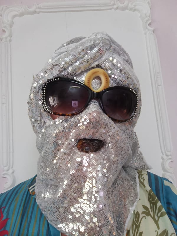 Sequined turban, vegetable props, and a dog in Tyshky