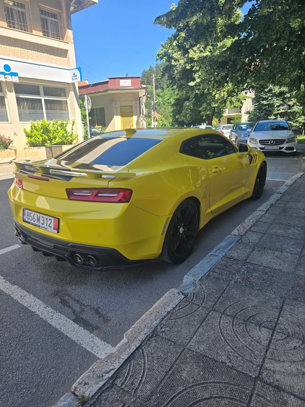 Yellow Camaro ZL1 parked on a Berkovitsa street