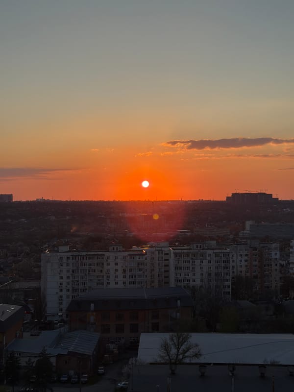 Sunset illuminates construction and apartments in Azov, Russia