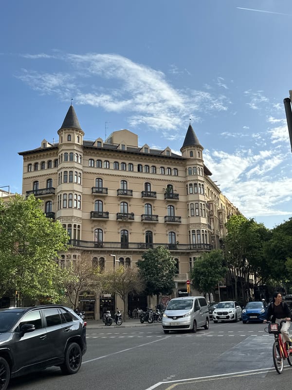 Witness documents Barcelona's historic architecture on sunny afternoon