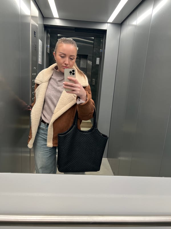 Woman documents winter day through selfies and kitten videos