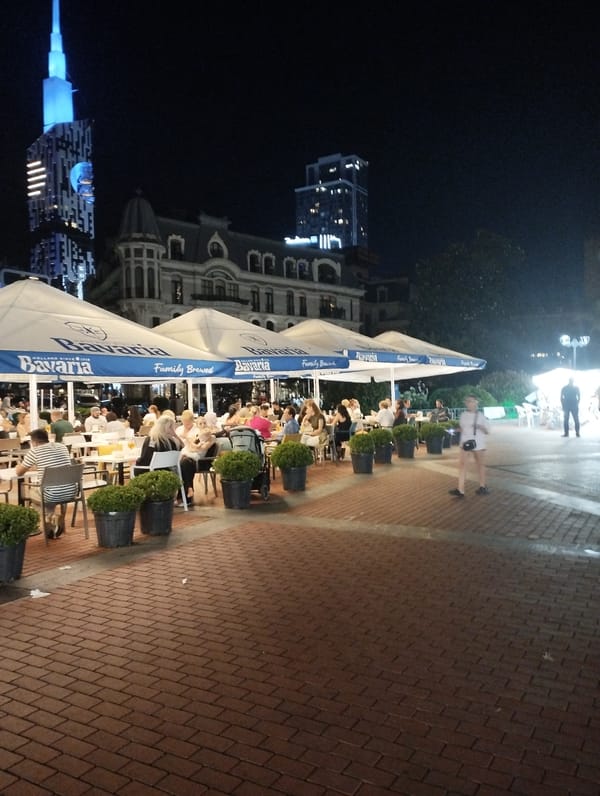 A summer night out along Batumi's lit-up waterfront and streets