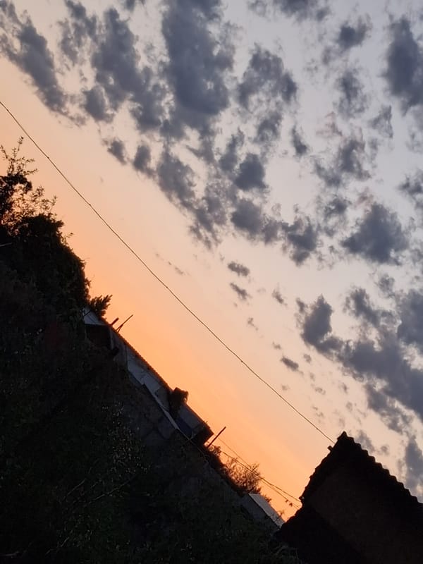 Sunset over Semey's outskirts, clouds and silhouettes