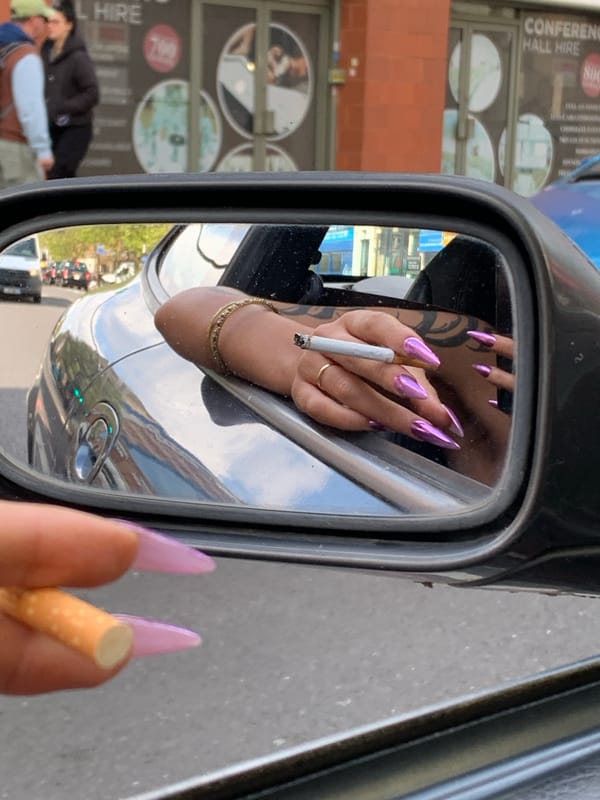 Disparate London moments captured: car mirror reflection, lime green