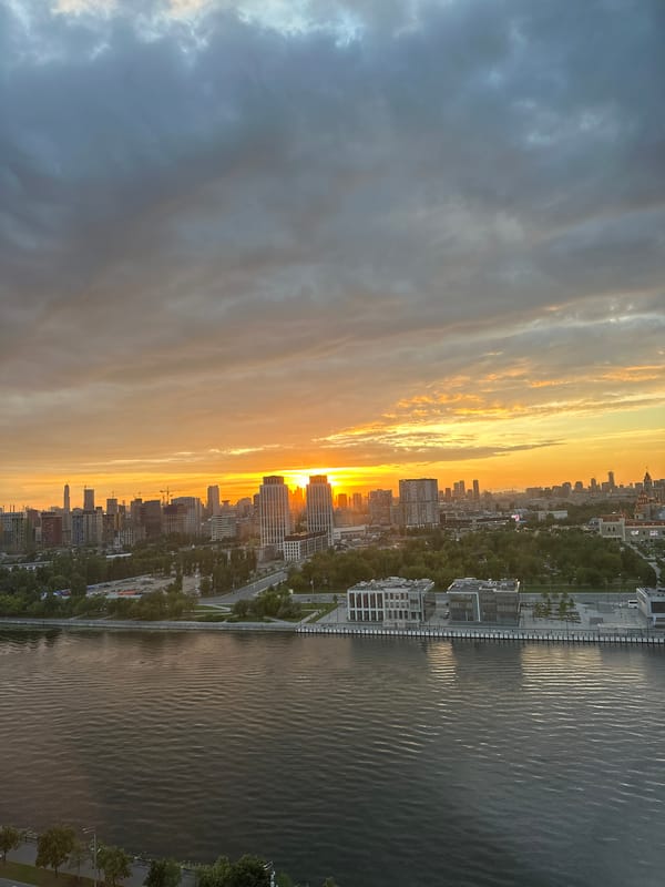 Moscow City and the Moskva River at golden-hour sunset