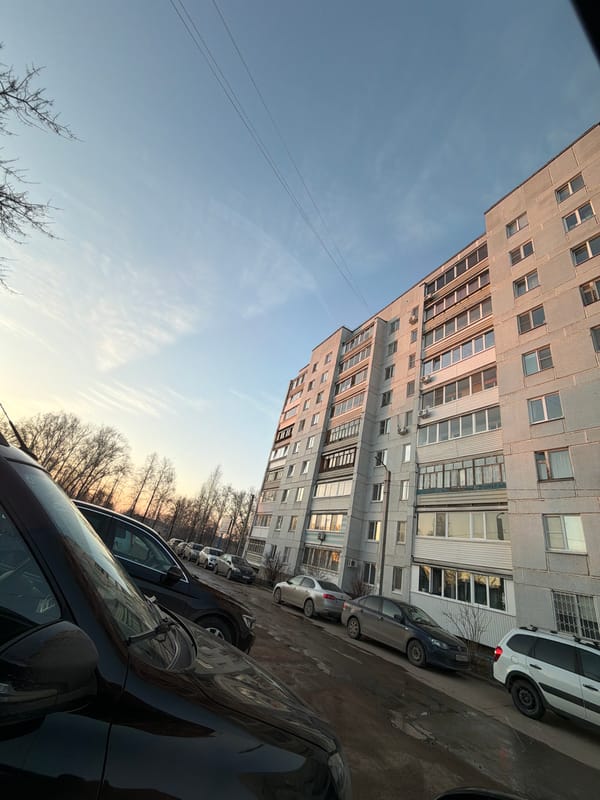Apartment building street scene documented in Chaikovsky Russia