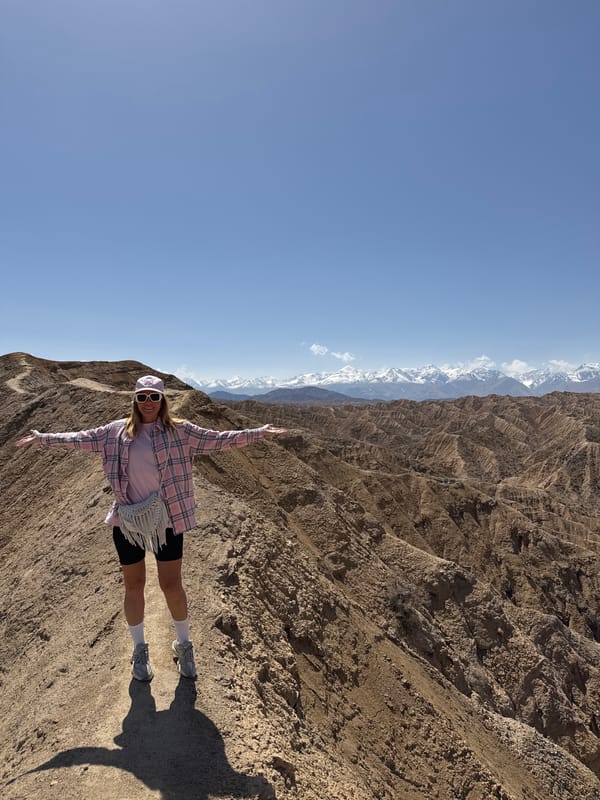 Person photographed in mountainous terrain in Bokonbayevo, Kyrgyzstan