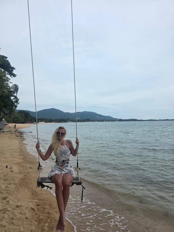 Beach morning at Bo Phut, posing among palm trees and rope swings