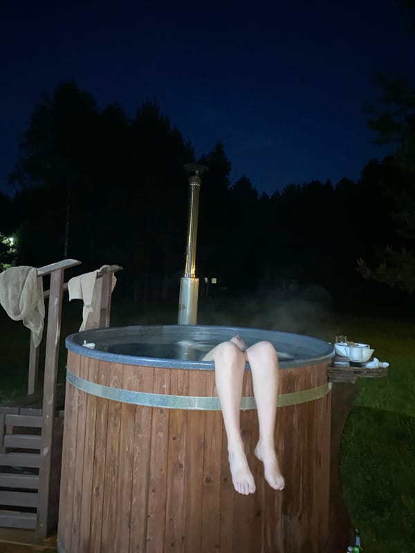 Nighttime hot tub gathering captured in Копнино, Russia