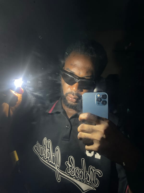 Man Takes Multiple Mirror Selfies in Lokoja Nigeria Evening