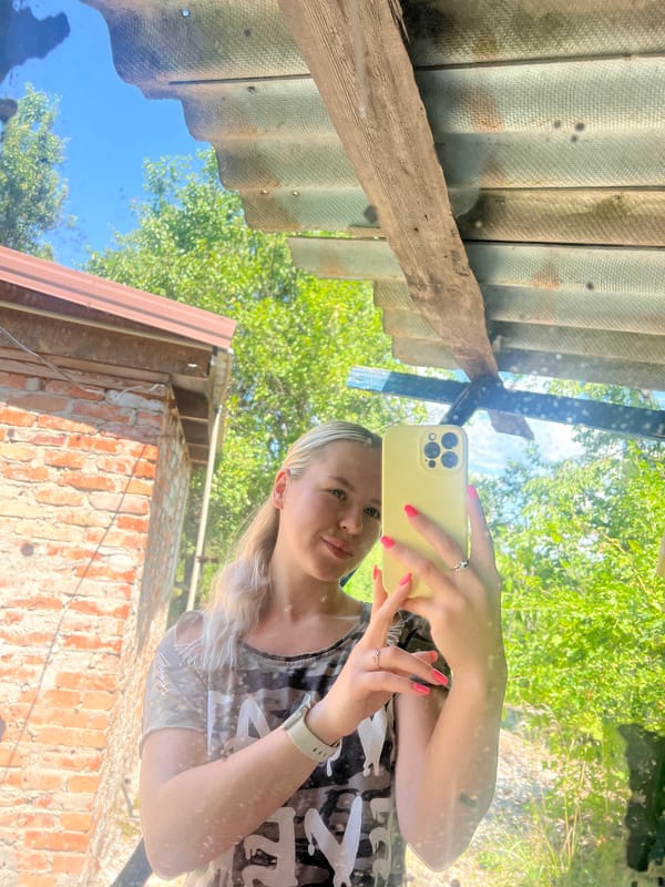 Selfie session at home with kittens nearby
