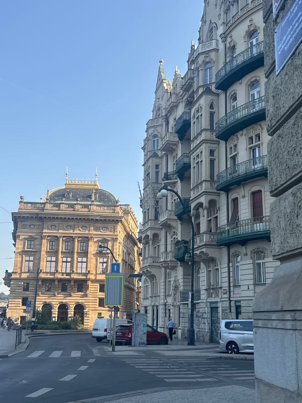 Prague's National Theatre and surrounding streets on a clear morning