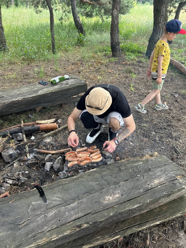 Bike crew stops for a forest cookout in central Ukraine
