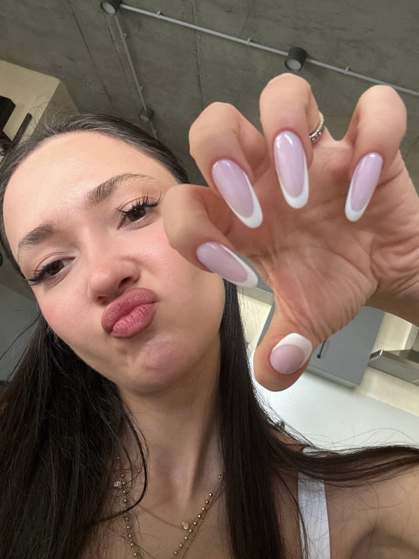Woman shows off French manicure, takes kitchen selfie in Armenia