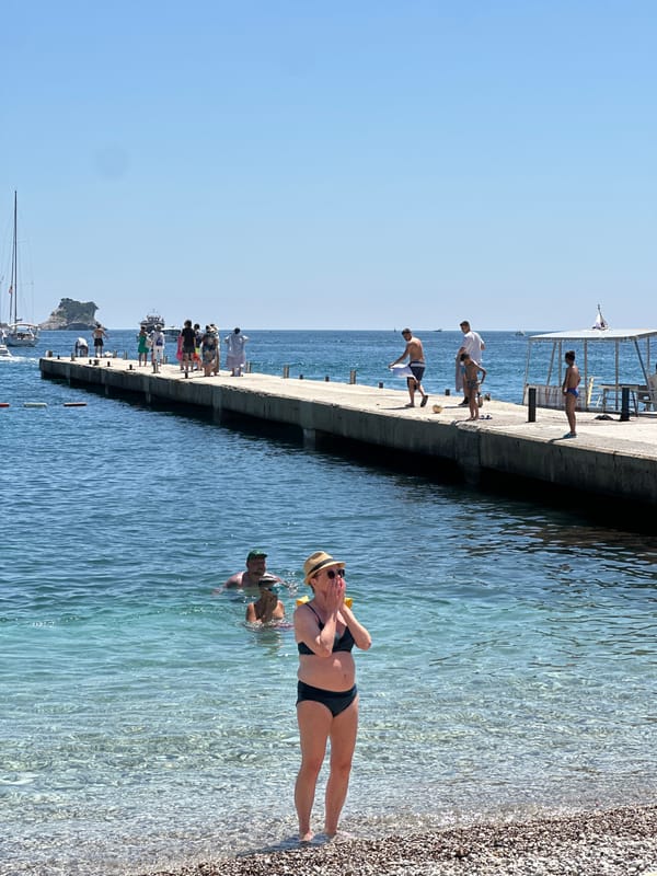 Sunny beach day captured at Budva pier, Montenegro