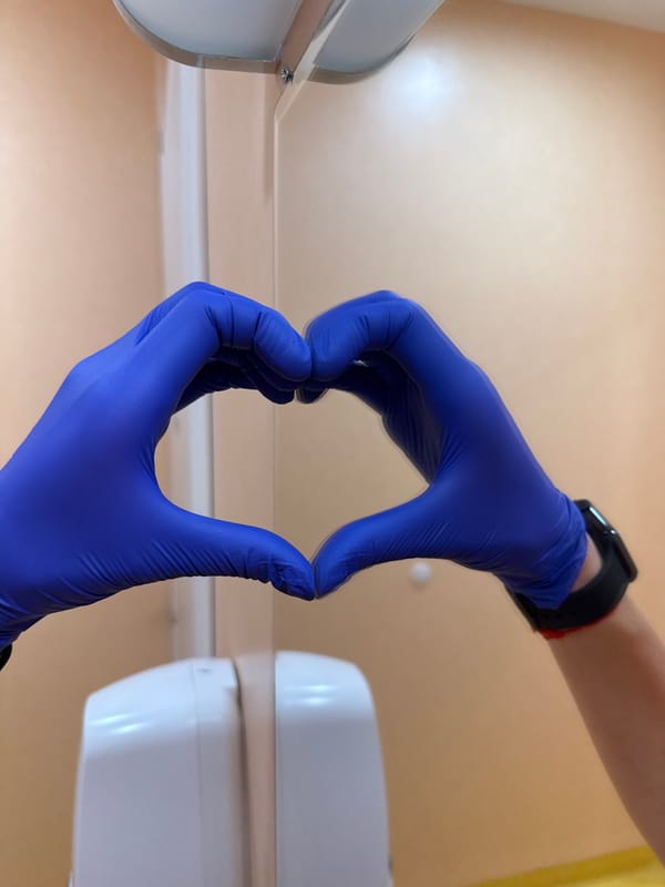 Person handles transparent material with protective gloves in Pleven